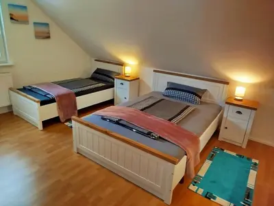 Ein Bett oder Betten in einem Zimmer der Unterkunft Ferienwohnung Peters