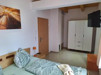 Ein Bett oder Betten in einem Zimmer der Unterkunft Sonnenhof Haus 2 - OG