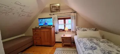 Ein Bett oder Betten in einem Zimmer der Unterkunft Ferienhaus am Marienkloster
