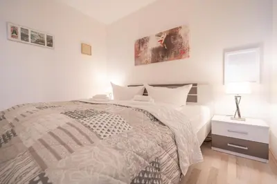 Ein Bett oder Betten in einem Zimmer der Unterkunft Waldperle
