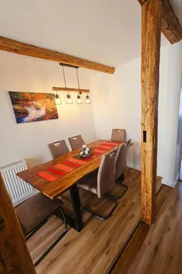 Ein Sitzbereich in der Unterkunft Ferienwohnung zu den Ilsefällen I