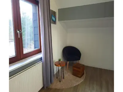 Ein Sitzbereich in der Unterkunft Ferienhaus im Kurort inkl Frühstück