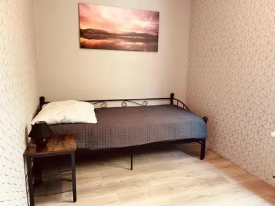 Ein Bett oder Betten in einem Zimmer der Unterkunft Das Urlaubszuhause für Familien, Großfamilien, Mehrfamilien und kleine Gruppen bis zum 12 Personen mit vielen Unterhaltungsmöglichkeiten im Harz