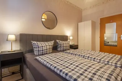 Ein Bett oder Betten in einem Zimmer der Unterkunft HIRSCH Apartment Waldhörnchen - zentral - ruhig