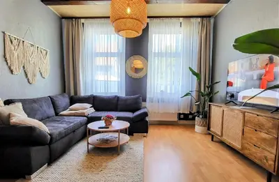Ein Sitzbereich in der Unterkunft HIRSCH Apartment Fuchsbau - zentral - Garten
