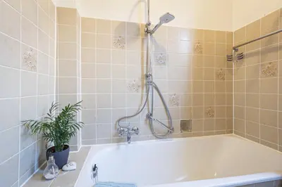 Ein Badezimmer in der Unterkunft HIRSCH Apartment Fuchsbau - zentral - Garten