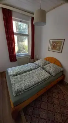 Ein Bett oder Betten in einem Zimmer der Unterkunft Ferienwohnung in Wernigerode