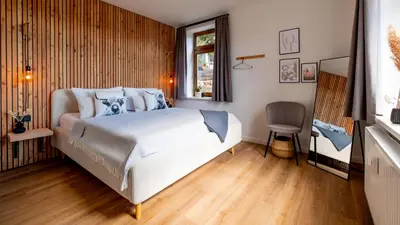 Ein Bett oder Betten in einem Zimmer der Unterkunft Eggert Alm Apartments