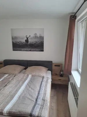 Ein Bett oder Betten in einem Zimmer der Unterkunft Ferienwohnung Susi