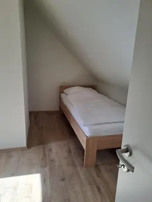 Ein Bett oder Betten in einem Zimmer der Unterkunft Ferienwohnung Else