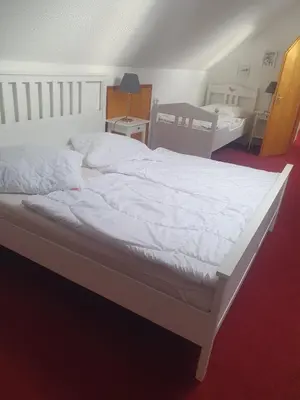 Ein Bett oder Betten in einem Zimmer der Unterkunft CrisAnd 5 Anjofina