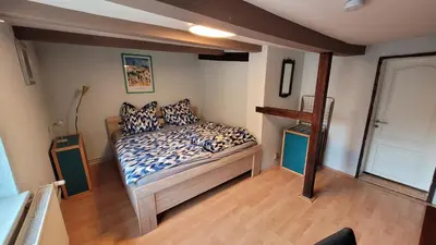 Ein Bett oder Betten in einem Zimmer der Unterkunft historisches Ferienhaus im Zentrum - für bis zu 7 Personen
