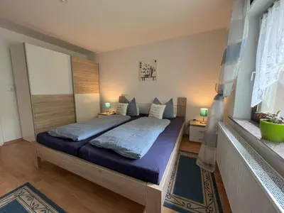 Ein Bett oder Betten in einem Zimmer der Unterkunft Gemütliche Ferienwohnung Nr. 4 im Harz für 2 Personen