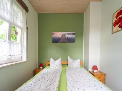 Ein Bett oder Betten in einem Zimmer der Unterkunft Quiet Garden Apartment