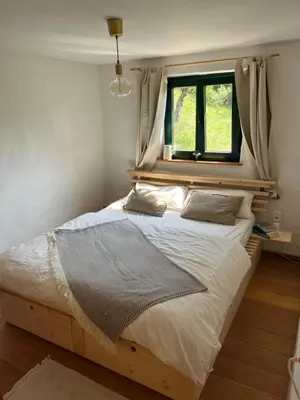 Ein Bett oder Betten in einem Zimmer der Unterkunft Sonnenberg Chalet