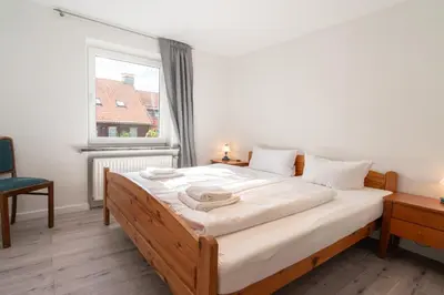 Ein Bett oder Betten in einem Zimmer der Unterkunft Ferienhaus Nia