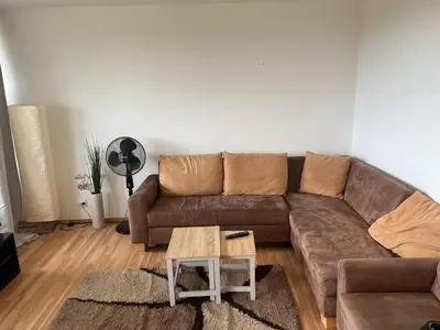 Ein Sitzbereich in der Unterkunft Cozy Apartment in Harz