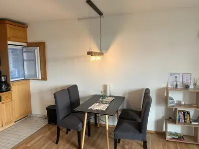 Ein Sitzbereich in der Unterkunft Cozy Apartment in Harz