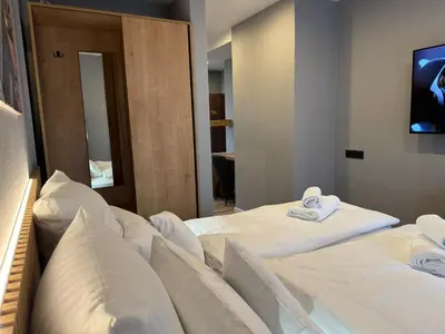 Ein Bett oder Betten in einem Zimmer der Unterkunft Goldener Stern