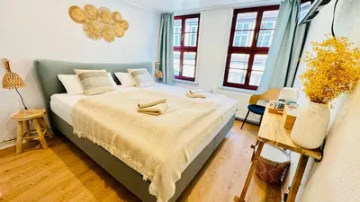 Ein Bett oder Betten in einem Zimmer der Unterkunft Bleibe am Steinweg