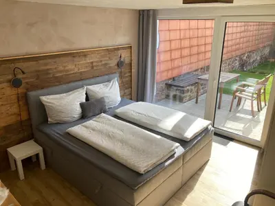 Ein Bett oder Betten in einem Zimmer der Unterkunft Ferienwohnungen Garzke