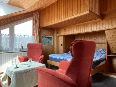 Ein Bett oder Betten in einem Zimmer der Unterkunft Berghof Arnika