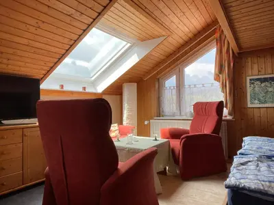 Ein Sitzbereich in der Unterkunft Berghof Arnika