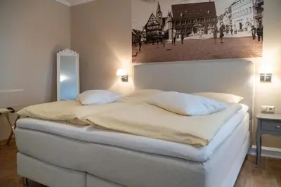 Ein Bett oder Betten in einem Zimmer der Unterkunft Ferienresidenz Schlossblick
