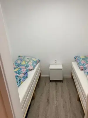 Ein Bett oder Betten in einem Zimmer der Unterkunft Apartment 3 502