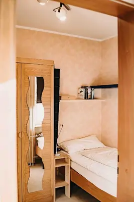 Ein Bett oder Betten in einem Zimmer der Unterkunft Apartment 7 115