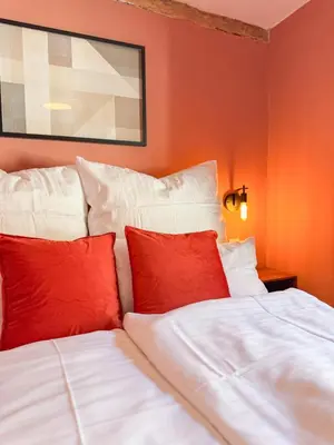 Ein Bett oder Betten in einem Zimmer der Unterkunft Haus Ludwig - Saniertes Fachwerkhaus im Harz - 12 Personen