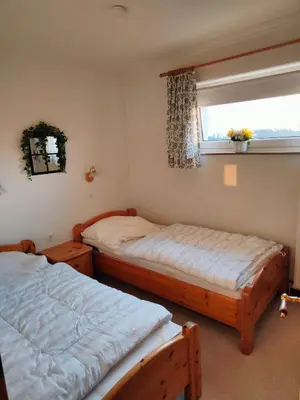 Ein Bett oder Betten in einem Zimmer der Unterkunft Apartment Mathilda mit Pool & Sauna