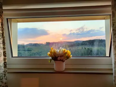 Blick auf den Sonnenuntergang/Sonnenaufgang von der Ferienwohnung aus oder aus der Nähe