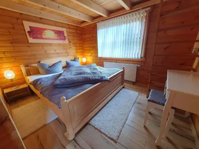 Ein Bett oder Betten in einem Zimmer der Unterkunft Ferienhaus Brockenbauer