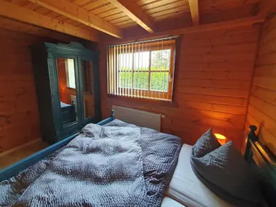 Ein Bett oder Betten in einem Zimmer der Unterkunft Ferienhaus Brockenbauer