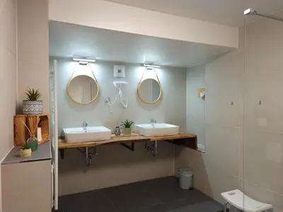 Ein Badezimmer in der Unterkunft Ferienwohnung am Hotel 