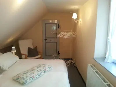 Ein Bett oder Betten in einem Zimmer der Unterkunft Ferienhaus Sankt Andreasberg