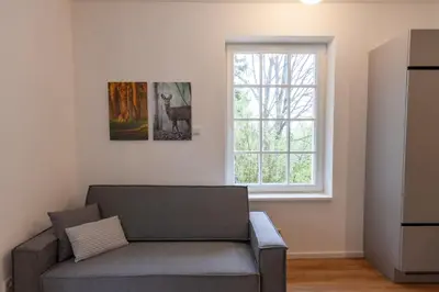 Ein Sitzbereich in der Unterkunft Ferienwohnung Hirschmann 2 mit Sauna und Balkon
