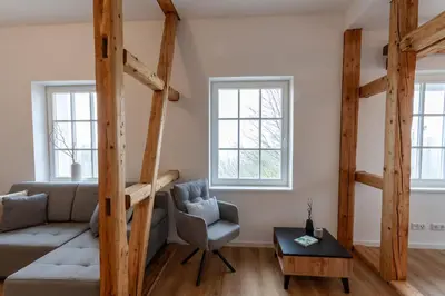 Ein Sitzbereich in der Unterkunft Ferienwohnung Hirschmann 5 mit Kamin