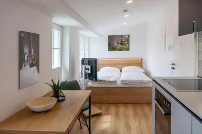Ein Bett oder Betten in einem Zimmer der Unterkunft Ferienwohnung Hirschmann 6
