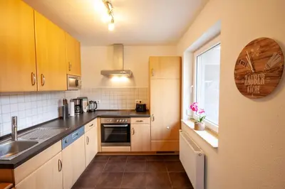 Küche/Küchenzeile in der Unterkunft Ferienhaus WanderNest mit Sauna, Garten und Grill
