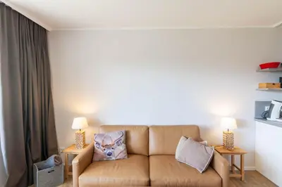 Ein Sitzbereich in der Unterkunft Ferienwohnung BergChalet 1 mit Balkon