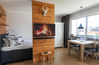 Ein Sitzbereich in der Unterkunft Ferienwohnung BergChalet 1 mit Balkon