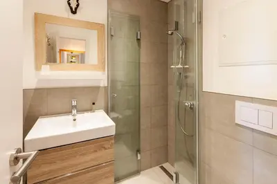 Ein Badezimmer in der Unterkunft Ferienwohnung BergChalet 2 mit Balkon