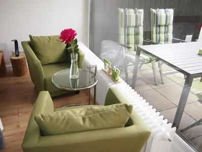 Ein Sitzbereich in der Unterkunft ApartmentHarzgrün2