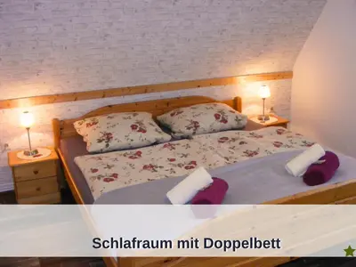 Ein Bett oder Betten in einem Zimmer der Unterkunft Okerstern