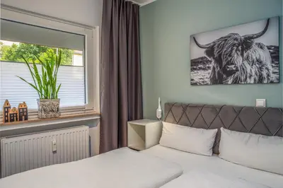 Ein Bett oder Betten in einem Zimmer der Unterkunft Wilder Hans