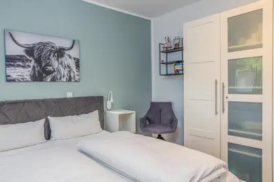 Ein Bett oder Betten in einem Zimmer der Unterkunft Wilder Hans