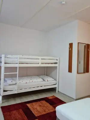 Ein Bett oder Betten in einem Zimmer der Unterkunft Pension Kreihe im Harz