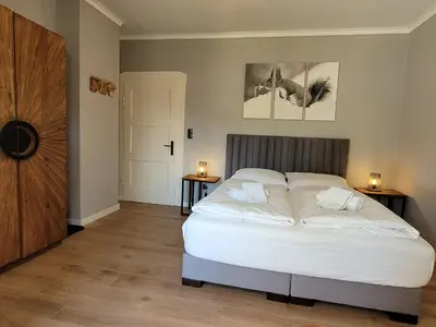 Ein Bett oder Betten in einem Zimmer der Unterkunft Villa Gesine